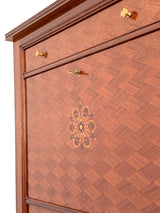 Détail de la face avant du secrétaire J.Leleu à motif de tressage 